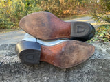 Size 9.5 men’s or 11 women’s Acme boots