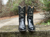 Size 10 men’s or 12 women’s Acme boots