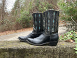 Size 10 men’s or 12 women’s Acme boots